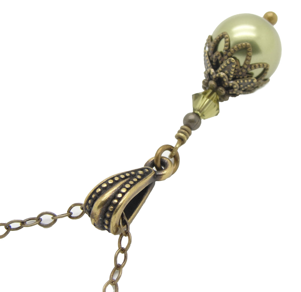 Pearl Dangle Necklace in the Neo Victorian Jewelry Style with Antiqued Brass and Olive Green Manmade Pearl and Crystal on white