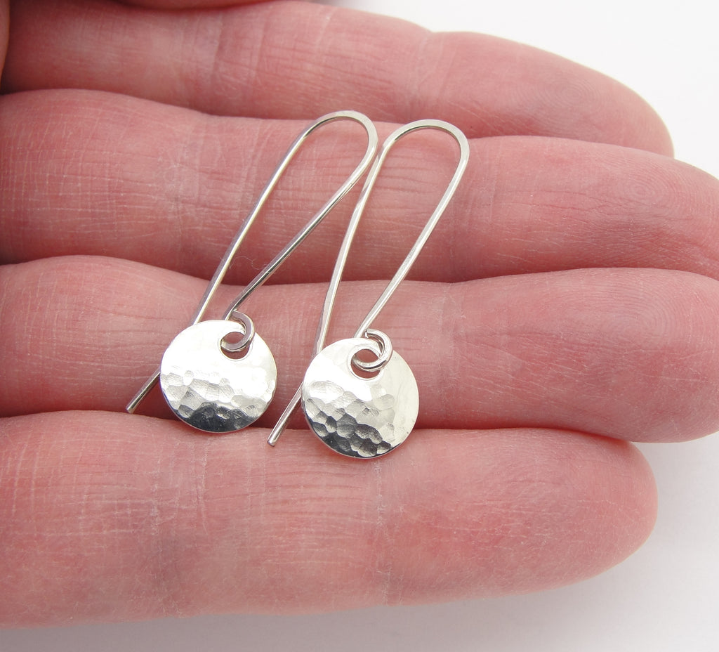 Tiny Handmade Sterling Silver Disc Earrings with 3/8 Inch Round Disks in hand