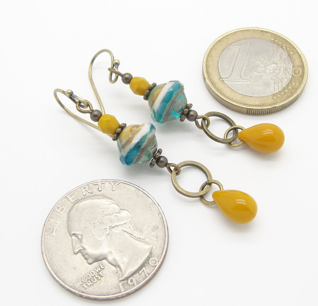 boho capri saturn earrings in antiqued brass with coins