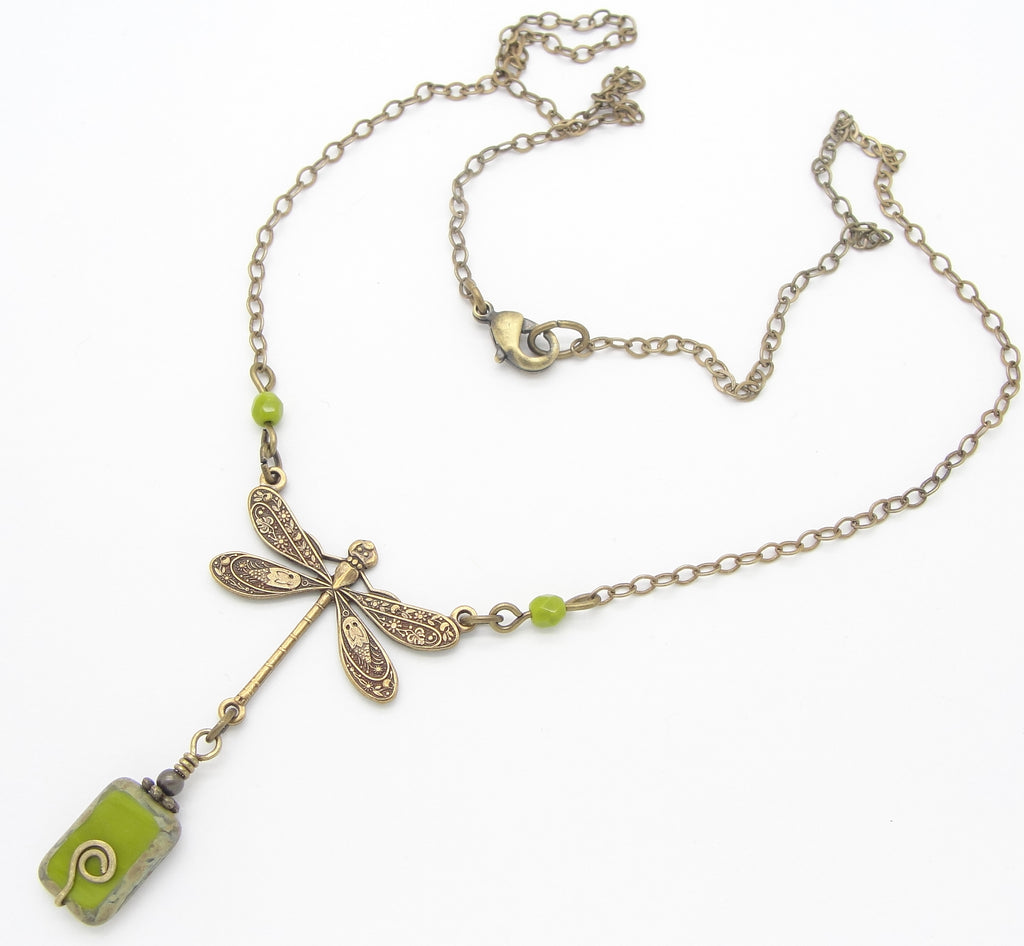 chartreuse or olive green dragonfly necklace in antiqued brass with lobster claw clasp