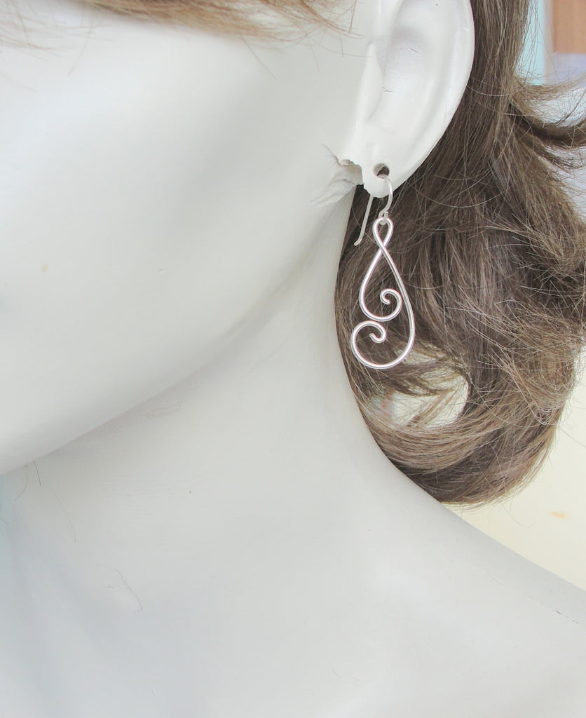 handmade sterling silver double spiral earrings on