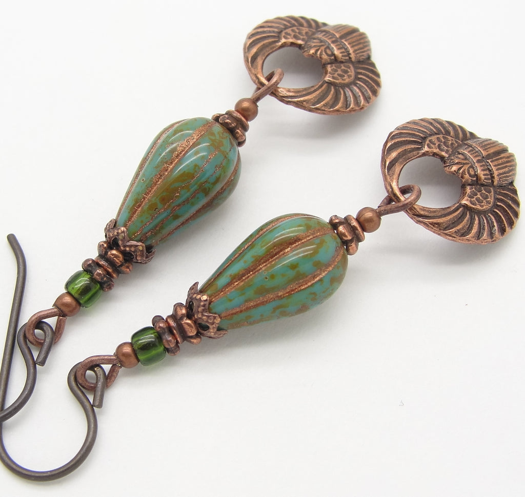 antiqued copper scarab earrings with turquoise blue green glass teardrop beads close