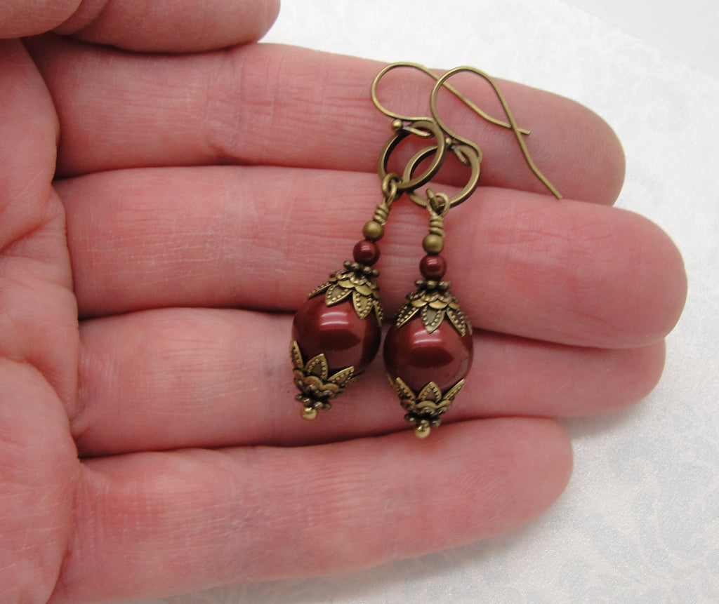 bordeaux red round manmade crystal pearl earrings with antiqued brass hand