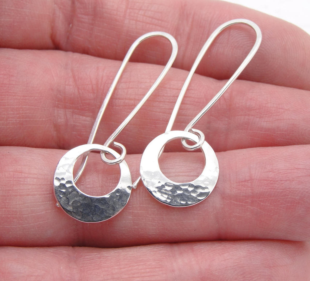 Handmade Sterling Silver Peephole Earrings with Little 1/2 Inch Round Discs in hand cloud cap jewelry