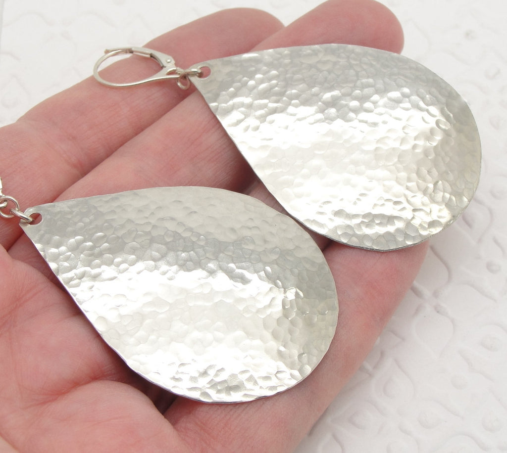 Extra Large Sterling Silver 2 Inch Teardrop Earrings in Hammered Finish in a Big, Bold Size by Cloud Cap Jewelry in hand