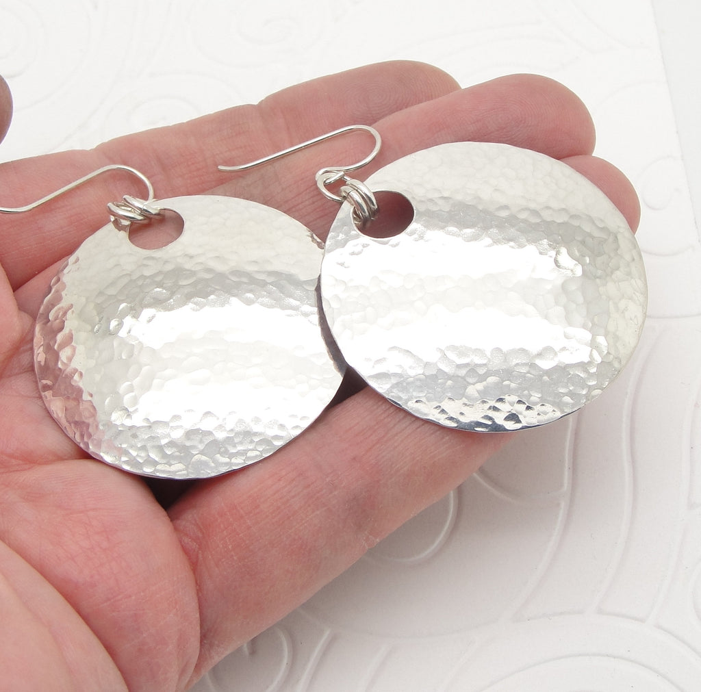 Large 1 1/2 Inch Disc Earrings in Hammered Sterling Silver with Small Peephole hand