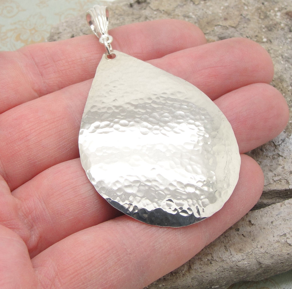 Extra Large Teardrop Pendant in Hammered Sterling Silver in 2 3/4 Inch Length in hand