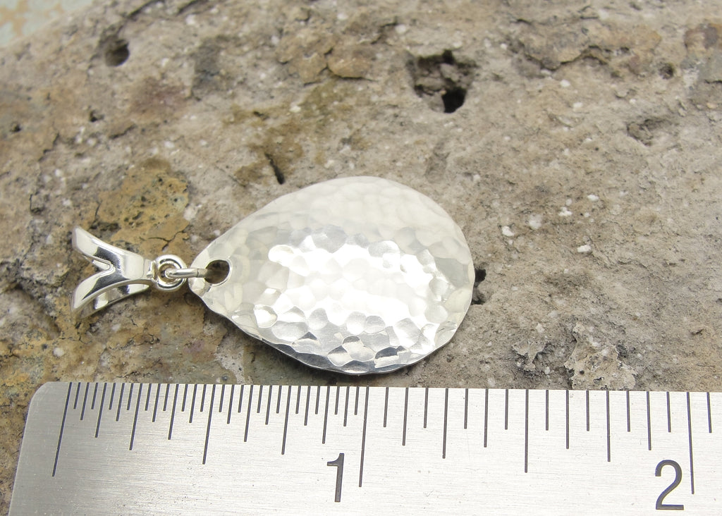 Medium Small Teardrop Pendant in Hammered Sterling Silver in 1 3/8 Inch Length with ruler