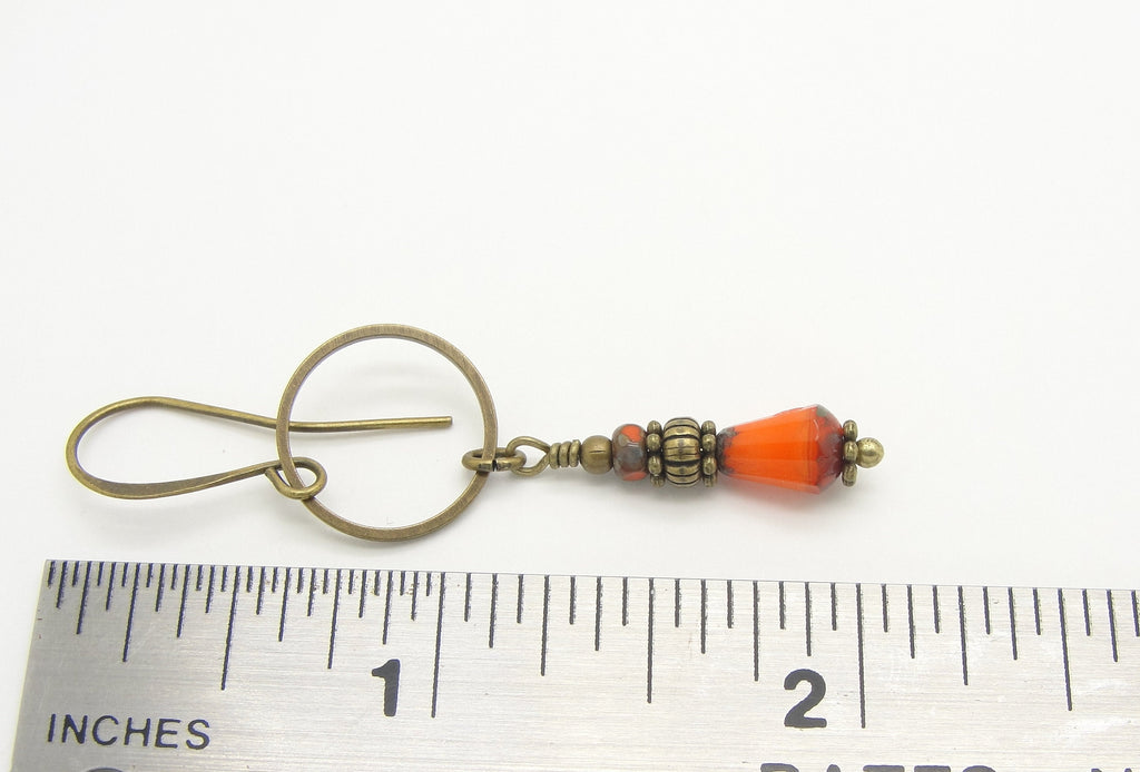 Long Safety Orange Earrings with Stacked Beads and Antiqued Brass Hoops ruler