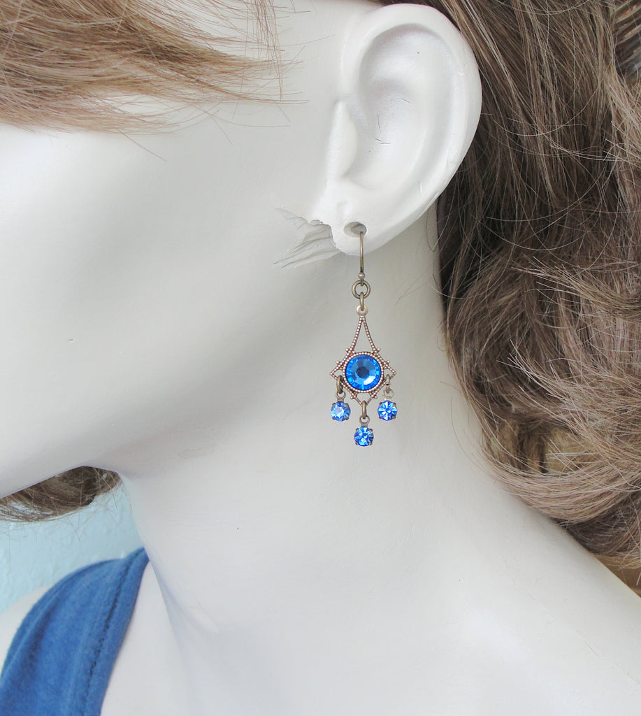 small sapphire blue crystal chandelier earrings in antiqued brass on