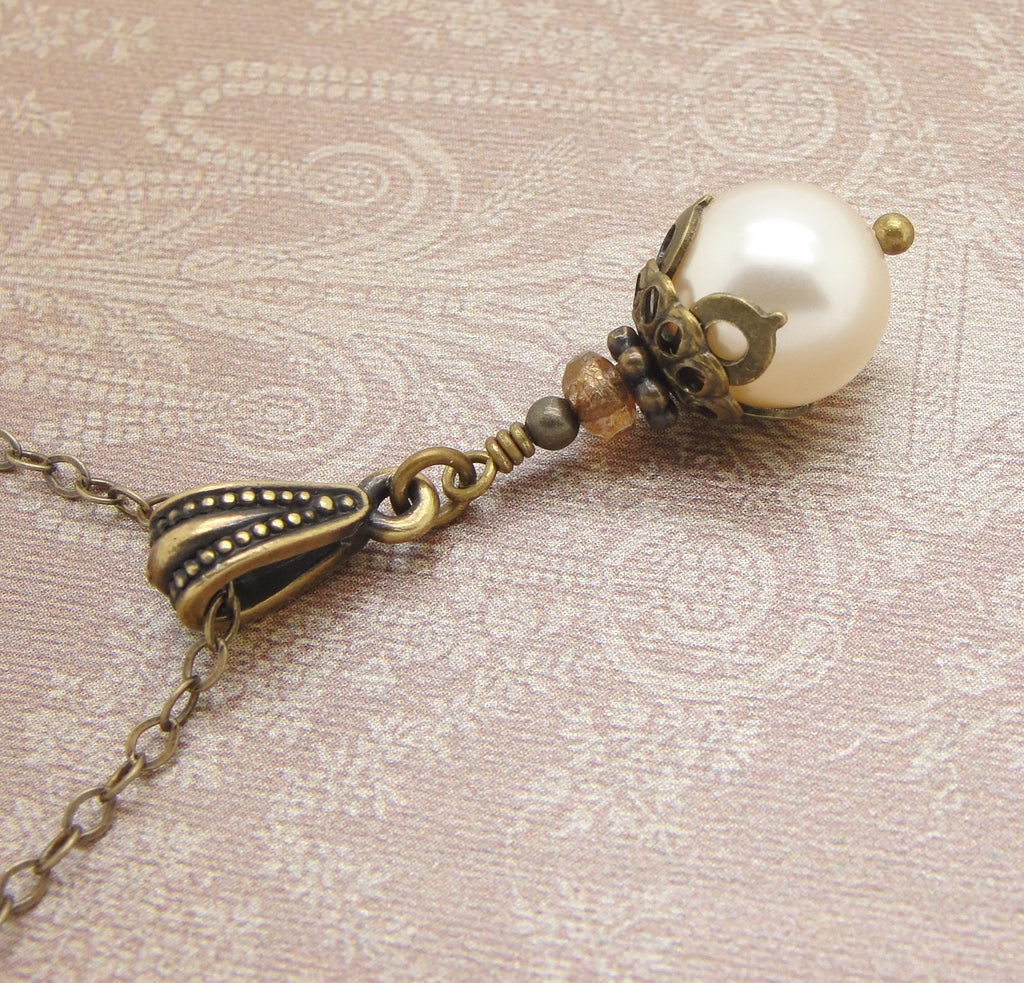 neo victorian necklace with cream crystal pearl in antiqued brass 